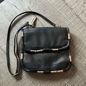 DKNY crossbody leather bag. Size 9x9.